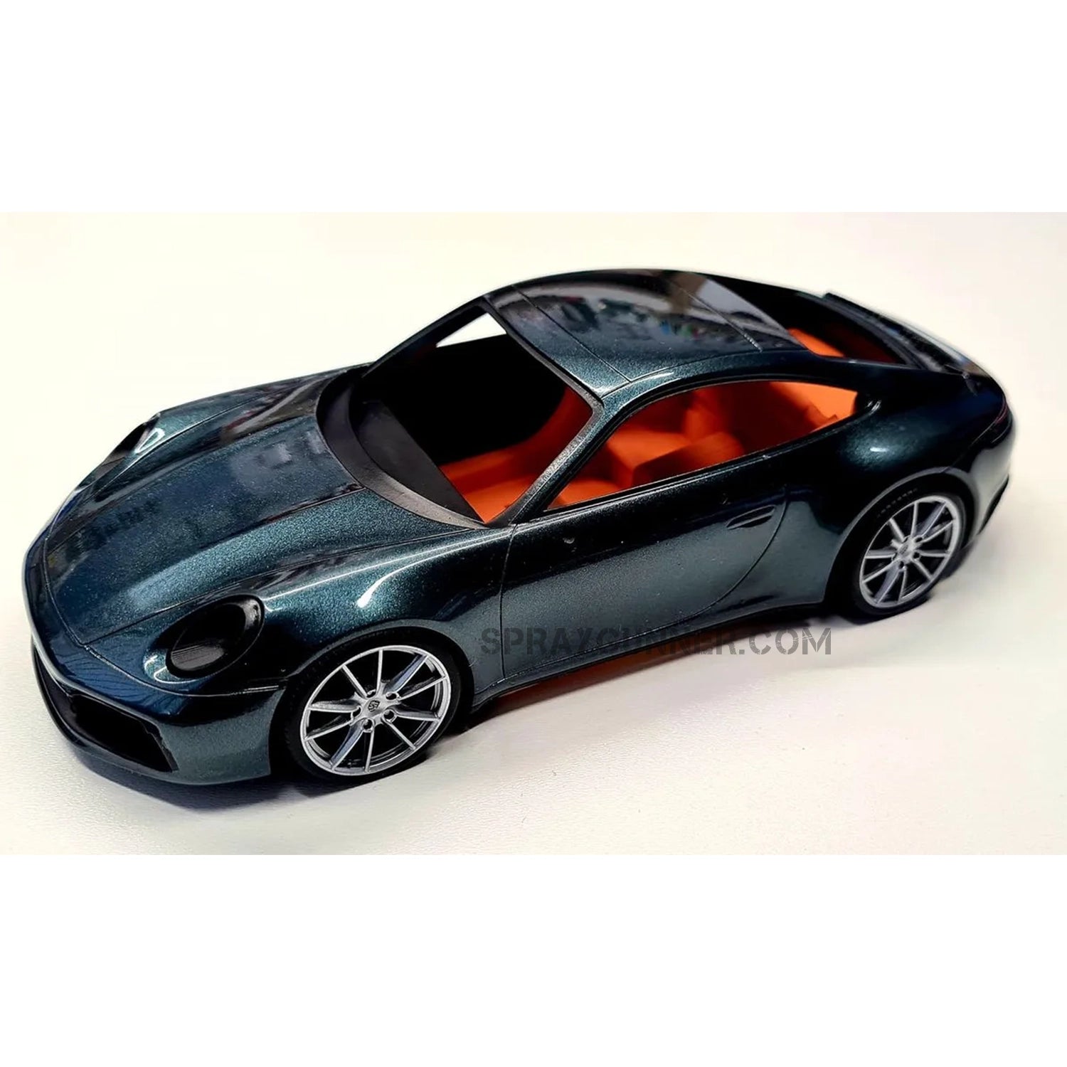 ALPHA MODEL 1/24 scale model Porsche 911 Carrera 2021 vehicle kit with a well crafted red and gold rim reproduction. Ideal for fans of model cars.