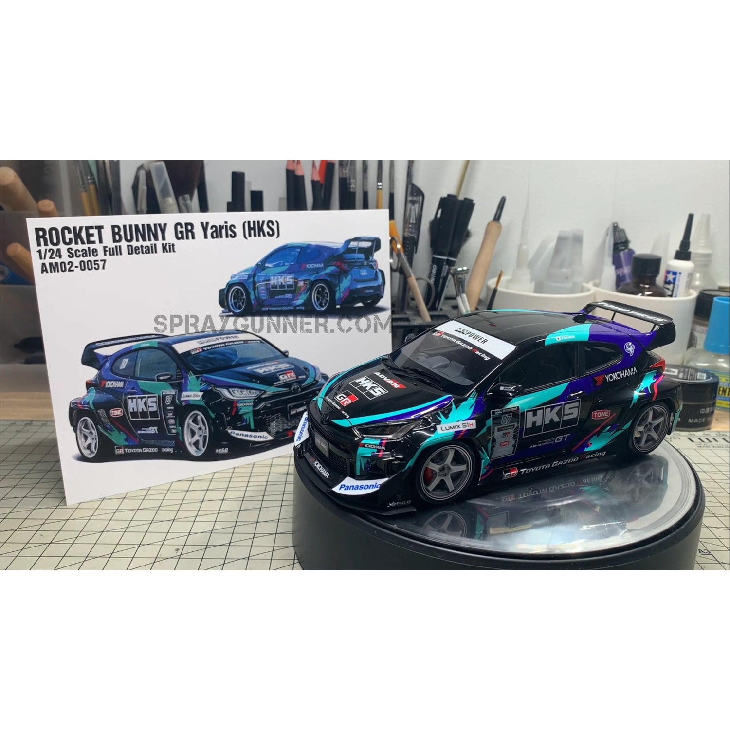 HKS livery and a highly detailed body are features of the ALPHA MODEL 1/24 Scale Model Car Kit Rocket Bunny GR Yaris (HKS). ideal for fans of scale models.