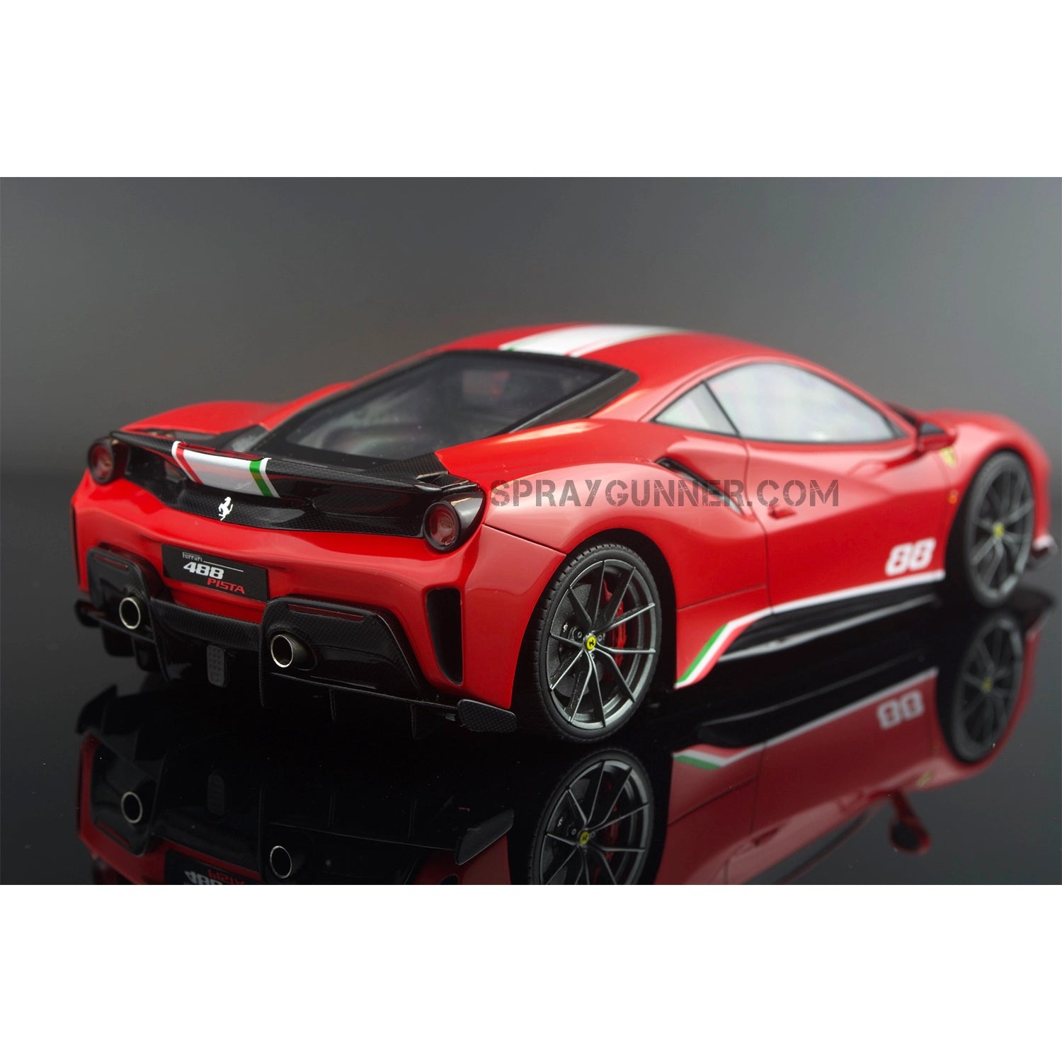 The Ferrari 488 Pista ALPHA MODEL 1/24 scale model car kit is a very realistic copy with a red body and racing stripes.