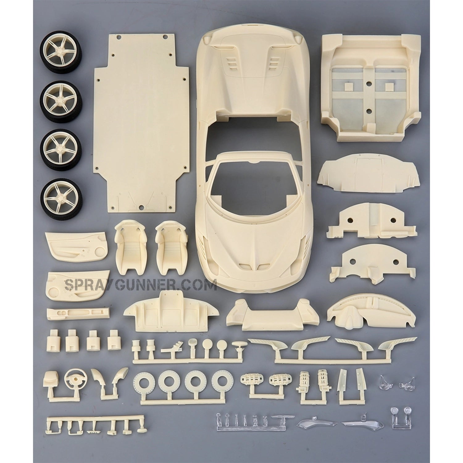 Complete unassembled parts of ALPHA MODEL 1/24 scale model Ferrari 458 Speciale A, including body panels, wheels, and interior components.
